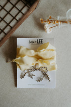 Leo & Lee Shoe Charm And Lace Set (Butter Yellow Laces, Silver Balloon Dog, Bow, Leaf)